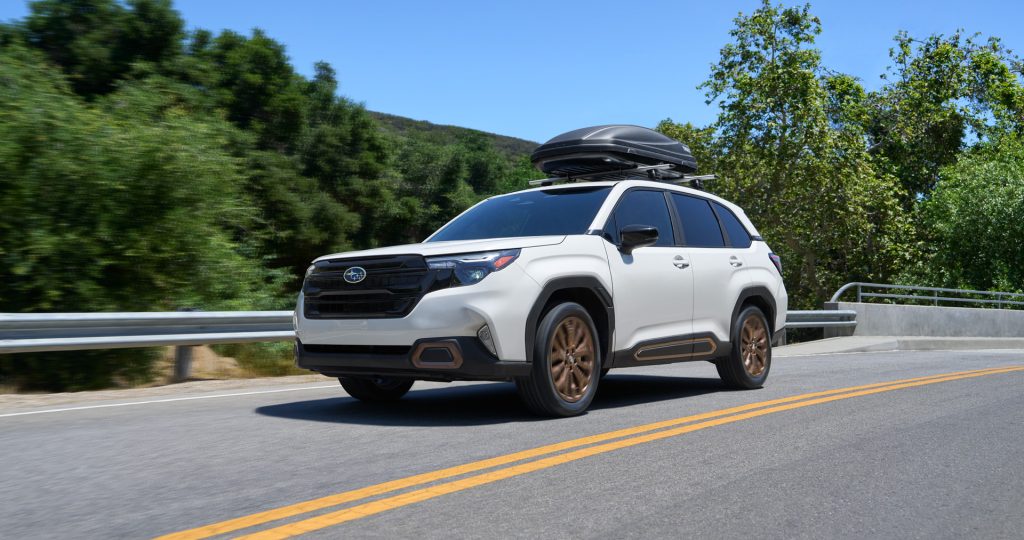 White Subaru Forester on road
