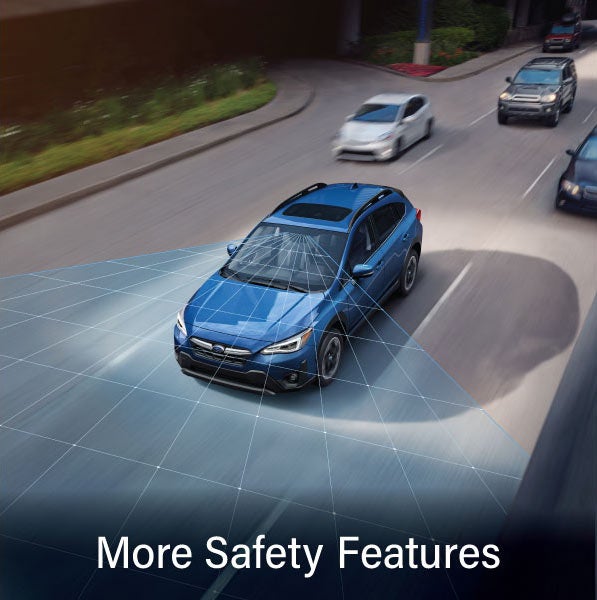 A Subaru Crosstrek in blue with the words &ldquo;More Safety Features&ldquo;. | Fitzgerald Subaru Rockville in Rockville MD